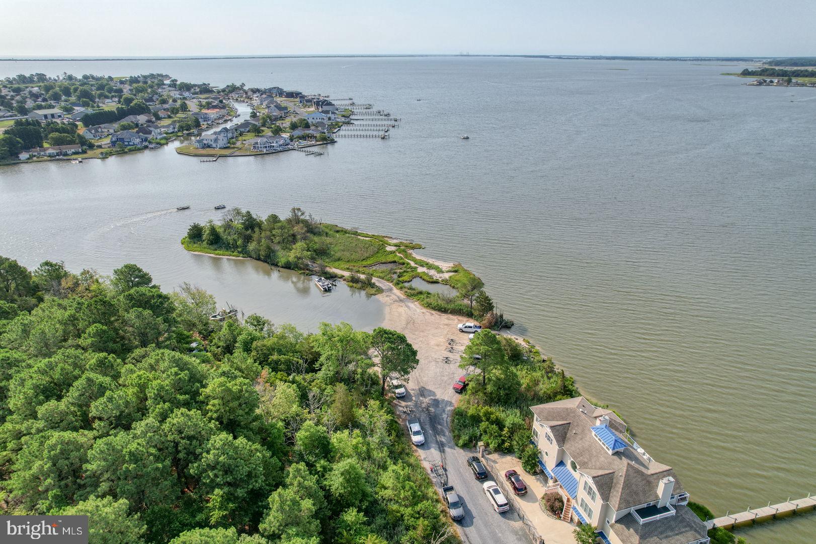 34772 Frontier Road Lewes, DE 19958 - Photo 47 of 66 an aerial view of a house with a lake view