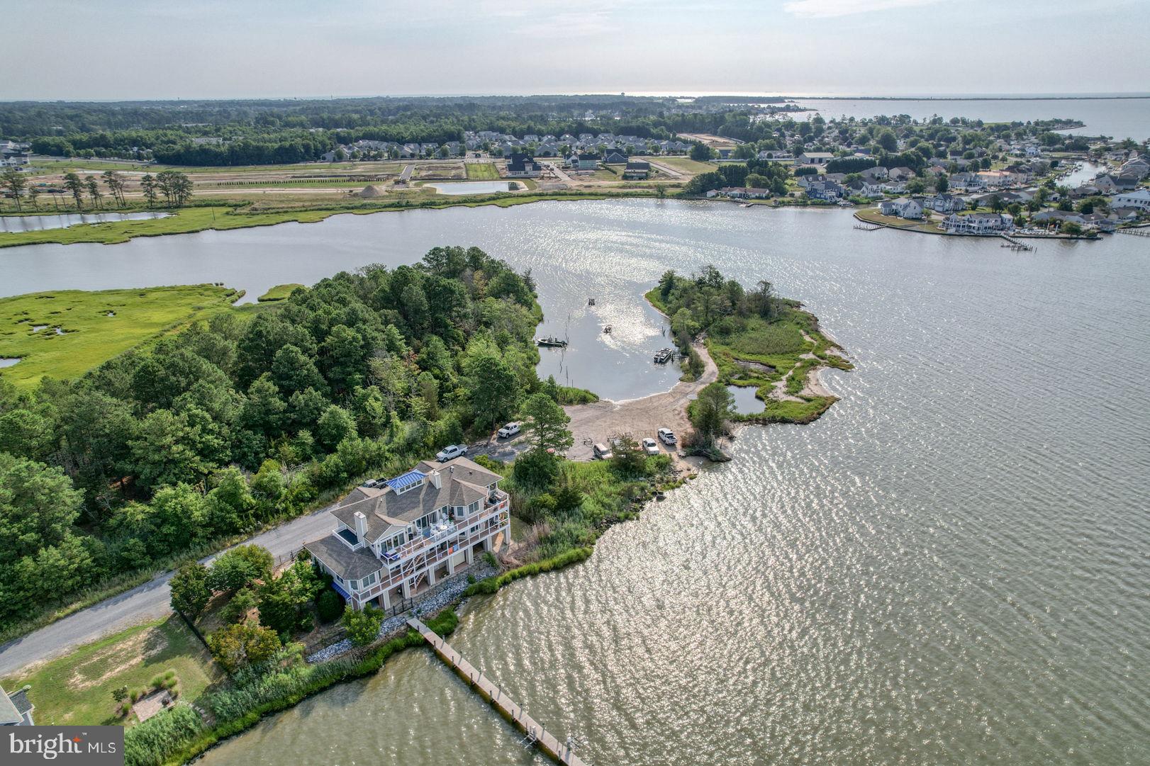 34772 Frontier Road Lewes, DE 19958 - Photo 51 of 66 a view of a lake with a city