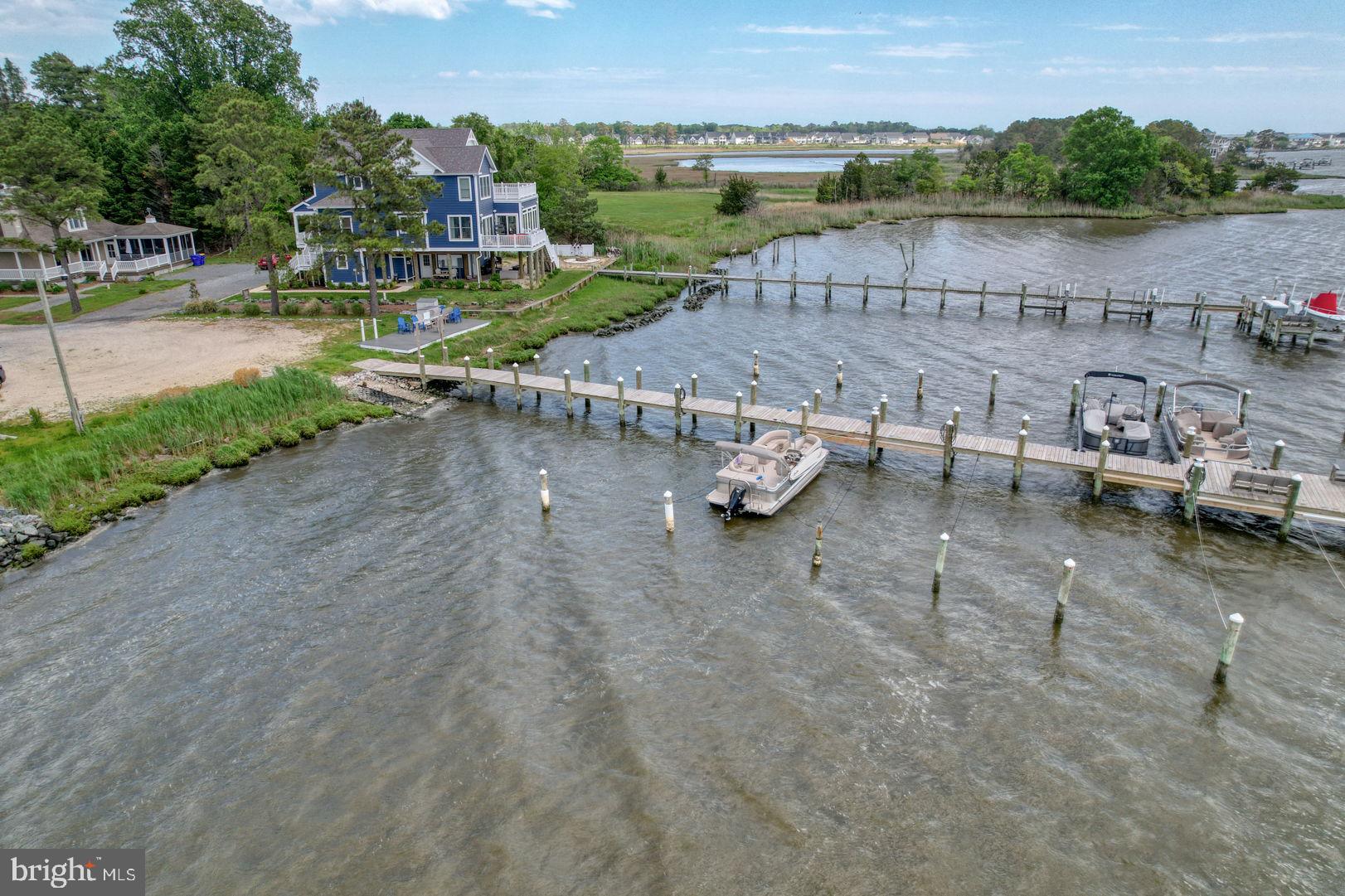 34772 Frontier Road Lewes, DE 19958 - Photo 53 of 66 a view of a lake with outdoor space