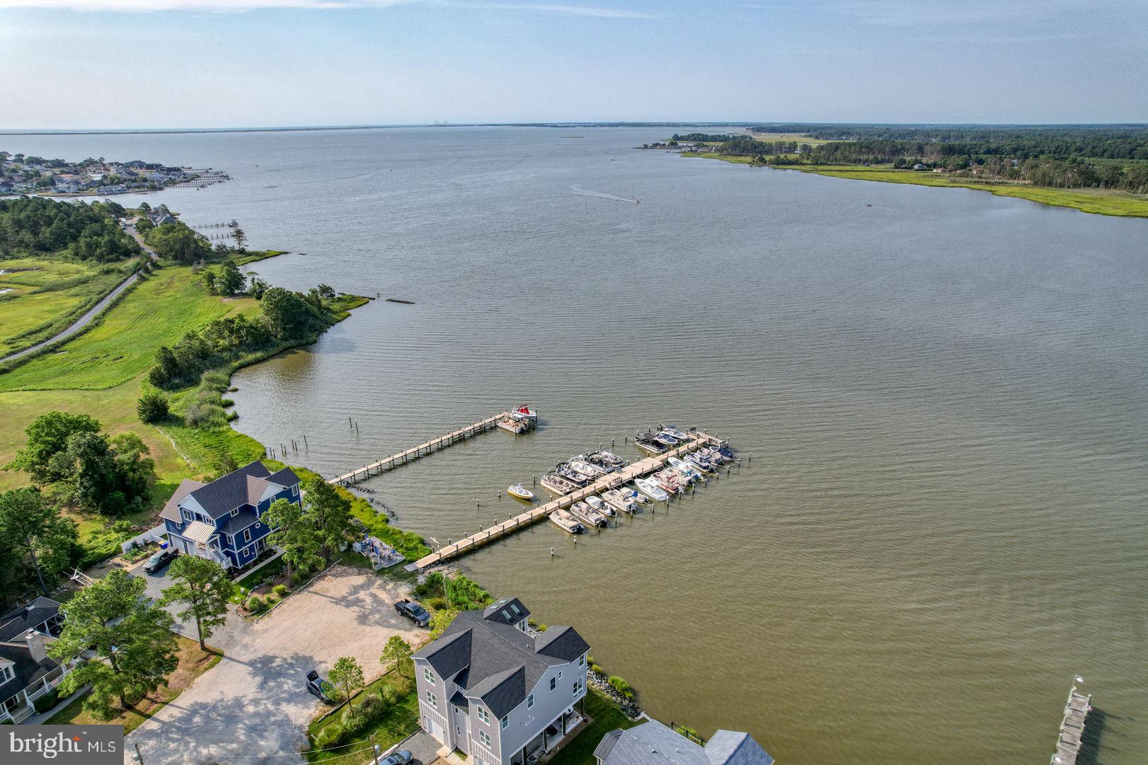 34772 Frontier Road Lewes, DE 19958 - Photo 58 of 66 an aerial view of a house with a lake view