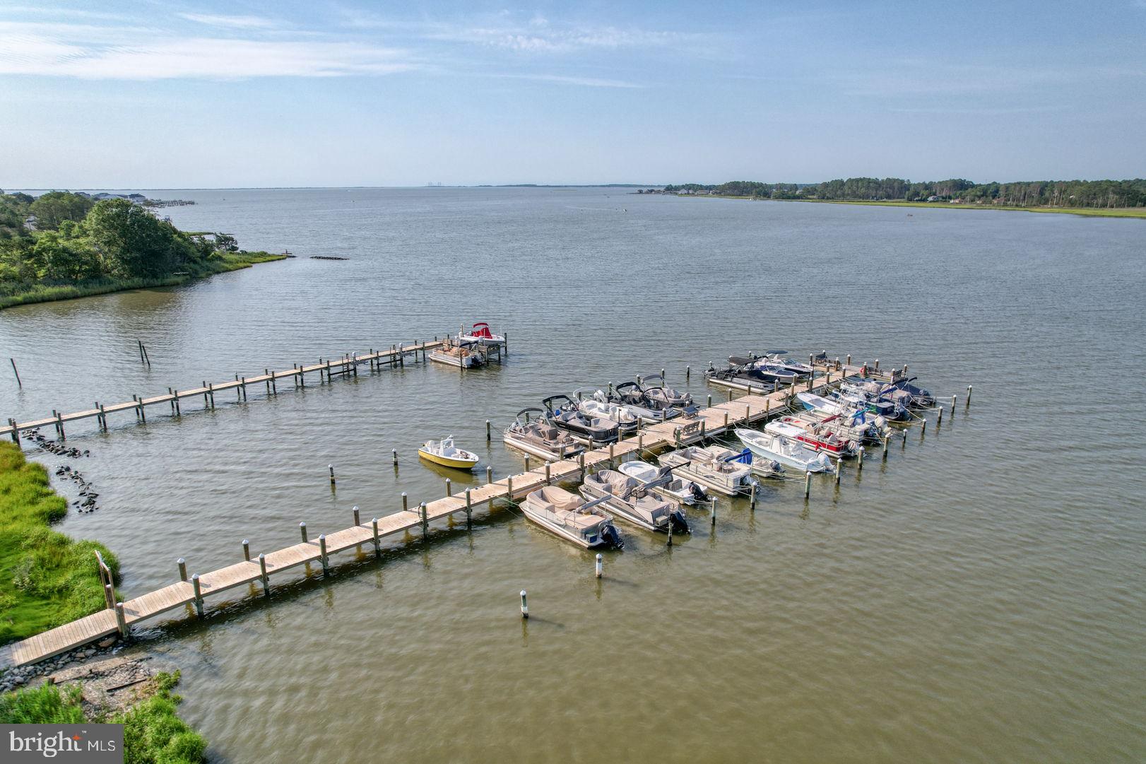 34772 Frontier Road Lewes, DE 19958 - Photo 59 of 66 a view of a lake with outdoor space
