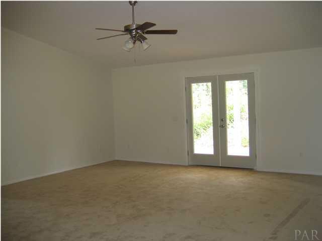 2159 Liberty Loop Road, Unit 10C Cantonment, FL 32533 - Photo 3 of 6 FAMILY ROOM WITH FRENCH DOORS LEADING OUT TO COVERED BACK PORCH