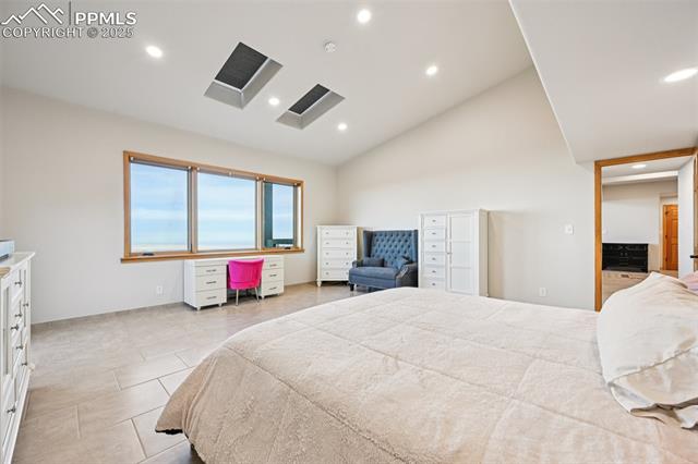 1417 Forest Road Manitou Springs, CO 80829 - Photo 23 of 50 Primary bedroom with its own private walk out, en suite 5 piece bathroom, sitting area and skylights