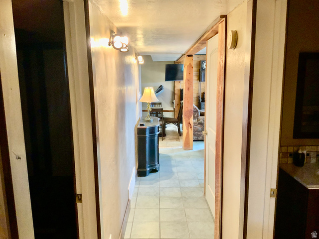 76 Highway 118 Monroe, UT 84754 - Photo 71 of 76 Corridor with light tile patterned floors and baseboards