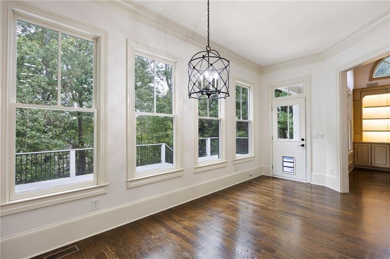 6186 Talmadge Run Acworth, GA 30101 - Photo 14 of 54 a view of an empty room with wooden floor and windows