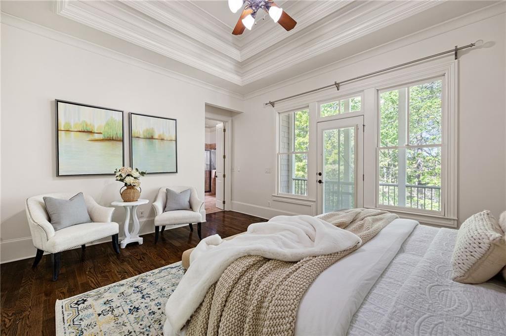 6186 Talmadge Run Acworth, GA 30101 - Photo 21 of 54 a bedroom with a bed a couch and a window