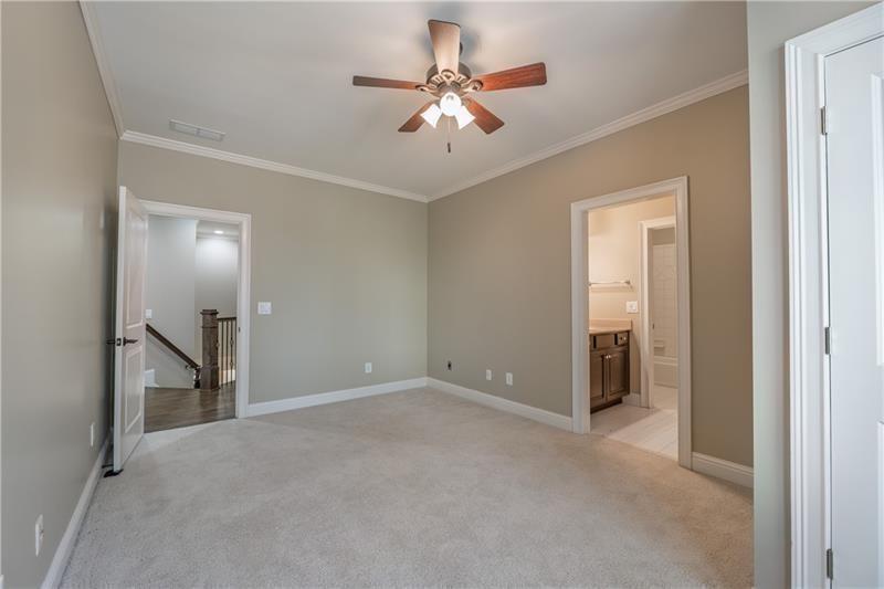 6186 Talmadge Run Acworth, GA 30101 - Photo 38 of 54 a view of an empty room with a ceiling fan