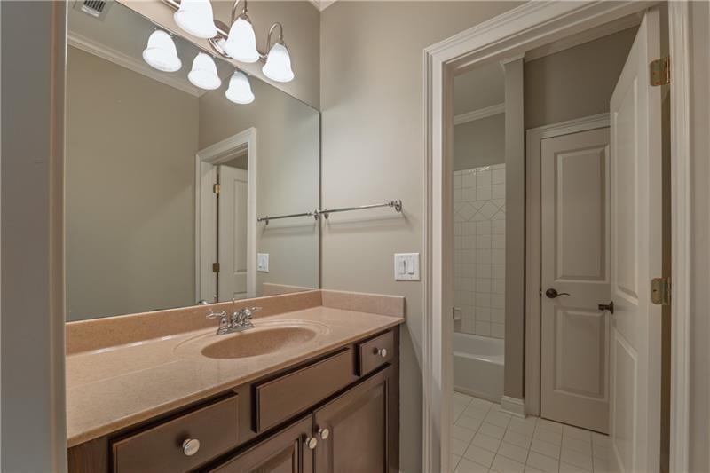 6186 Talmadge Run Acworth, GA 30101 - Photo 40 of 54 a bathroom with a sink vanity and a mirror