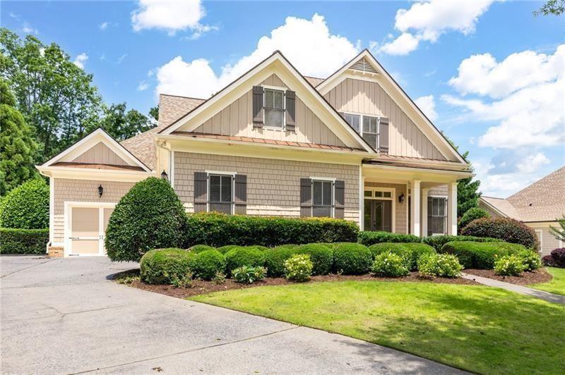 6186 Talmadge Run Acworth, GA 30101 - Photo 50 of 54 a front view of a house with a yard