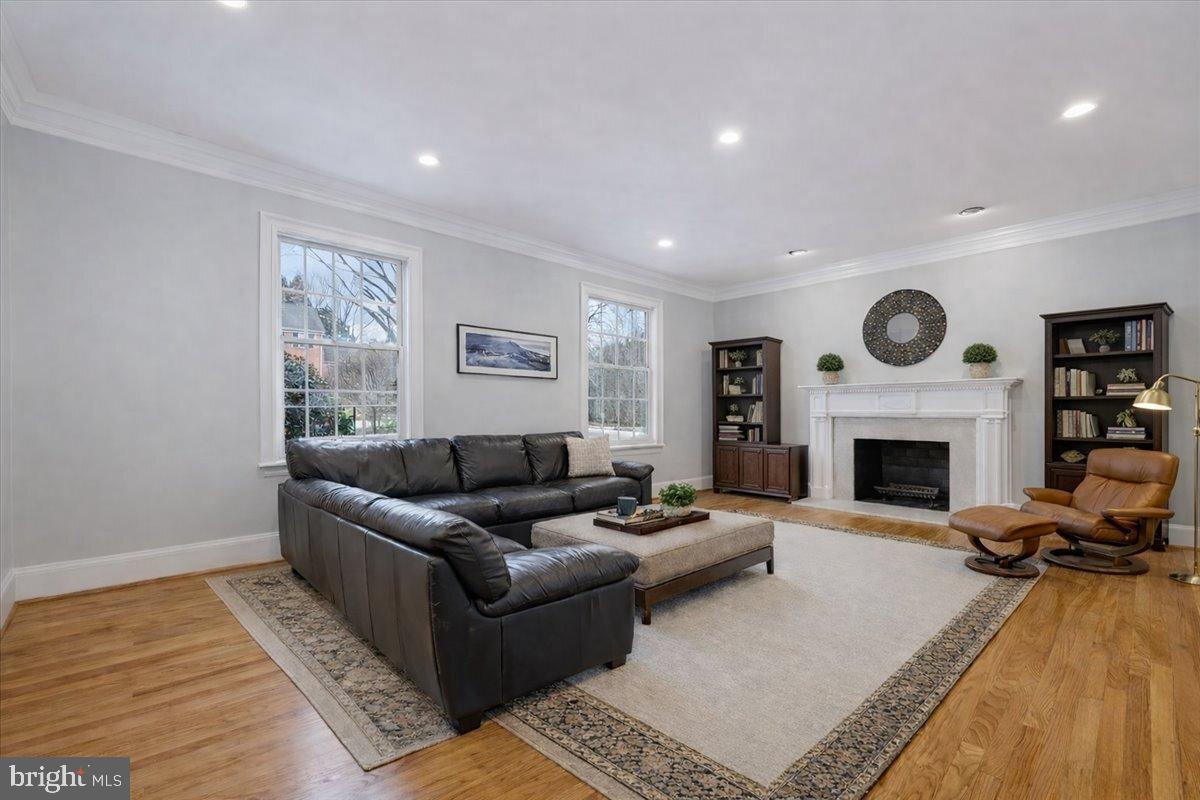 9917 Kendale Road Potomac, MD 20854 - Photo 11 of 39 a living room with furniture and a fireplace
