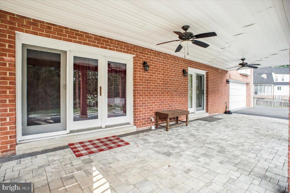 9917 Kendale Road Potomac, MD 20854 - Photo 32 of 39 a view of a entryway door front of a house