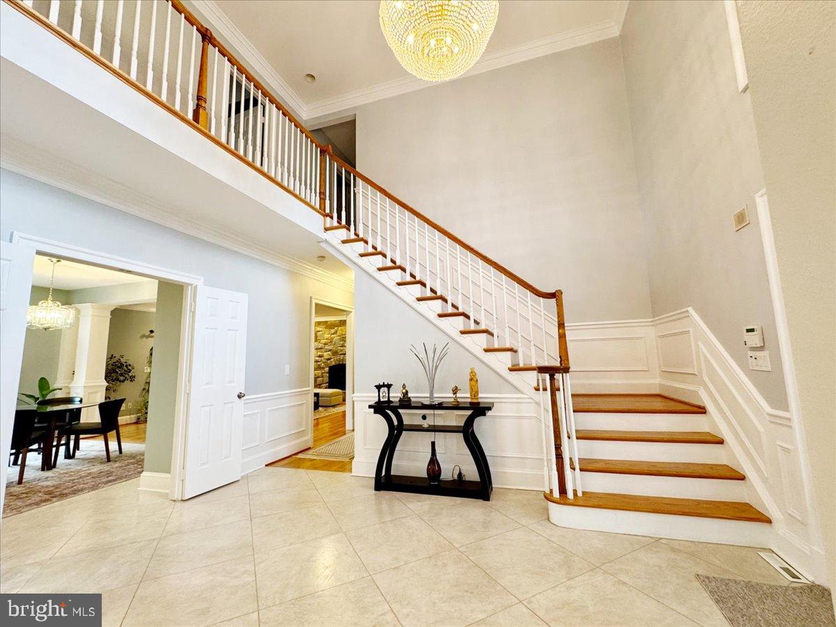 9917 Kendale Road Potomac, MD 20854 - Photo 5 of 39 a view of entryway and hall