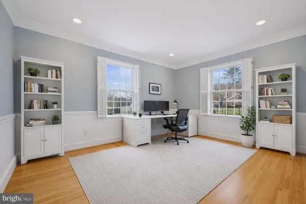 a workspace with furniture and window