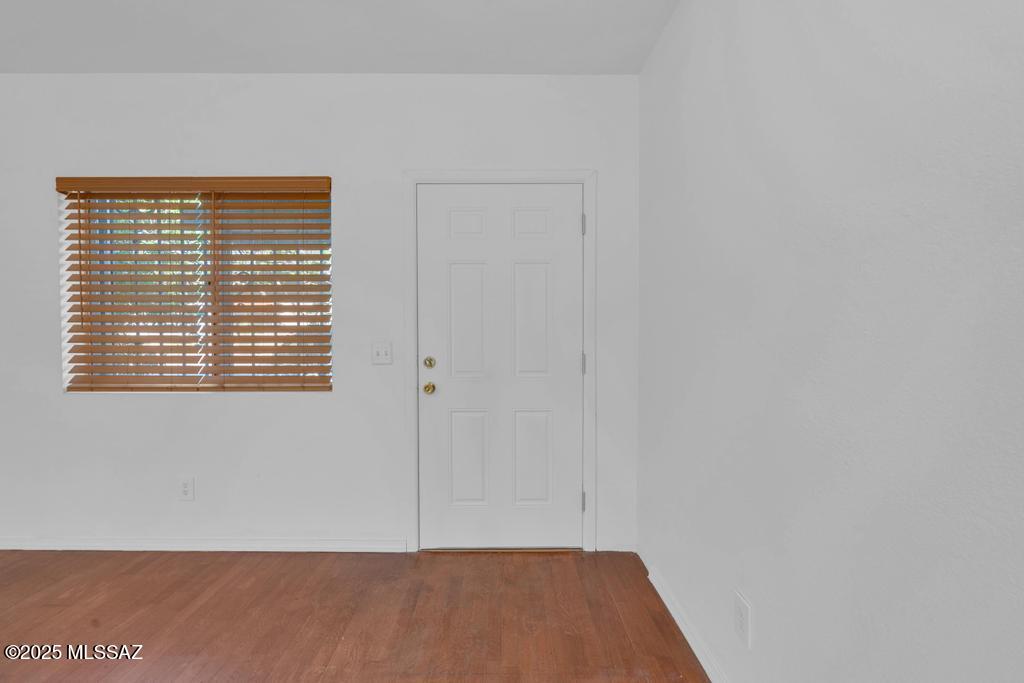 211 West Roger Road, Unit 35 Tucson, AZ 85705 - Photo 13 of 24 a view of an empty room with a window
