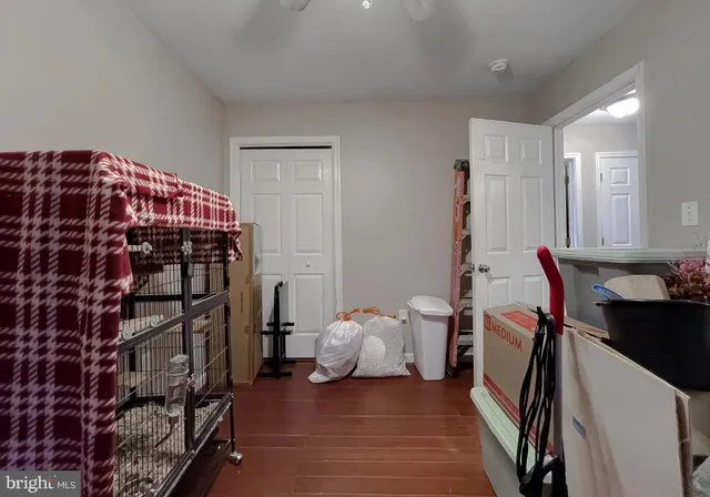 a room with furniture and wooden floor