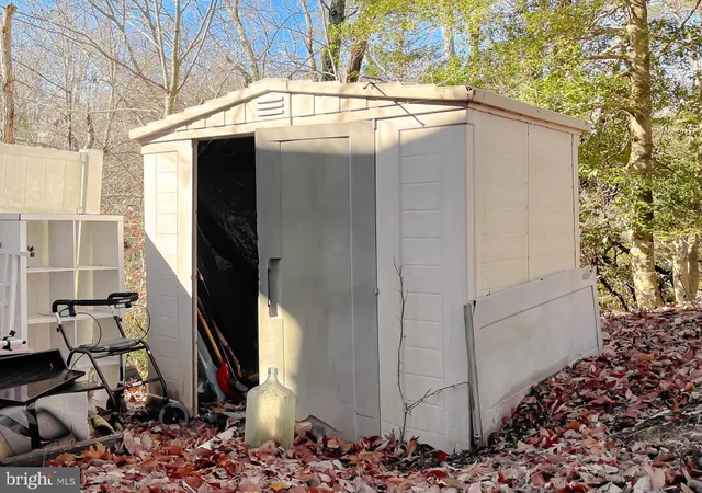 a view of a backyard of the house