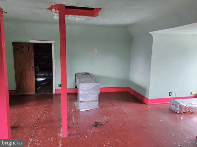 a bathroom with a tub and a sink