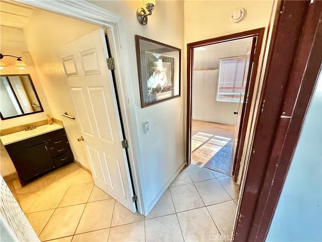 a bathroom with a sink a toilet and tub