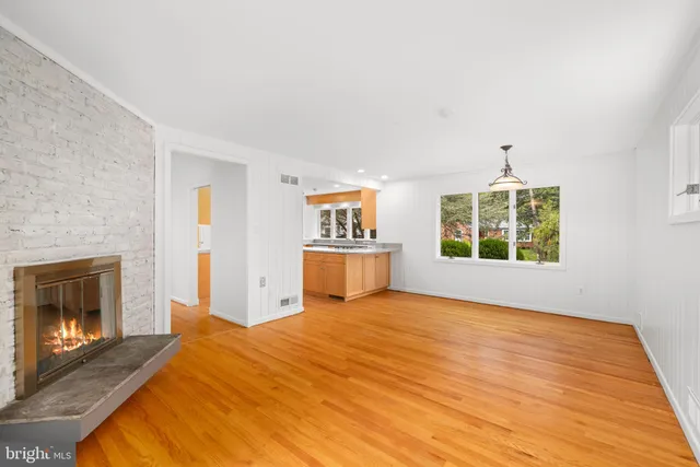 a bedroom with a bed and a fireplace