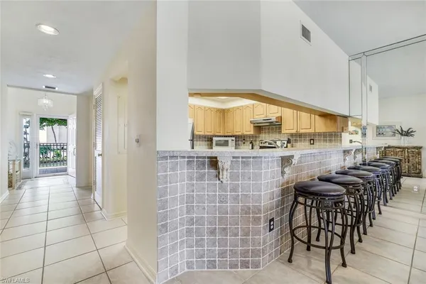 $12,000 | 9380 Gulf Shore Drive, Unit 102, Naples, FL 34108