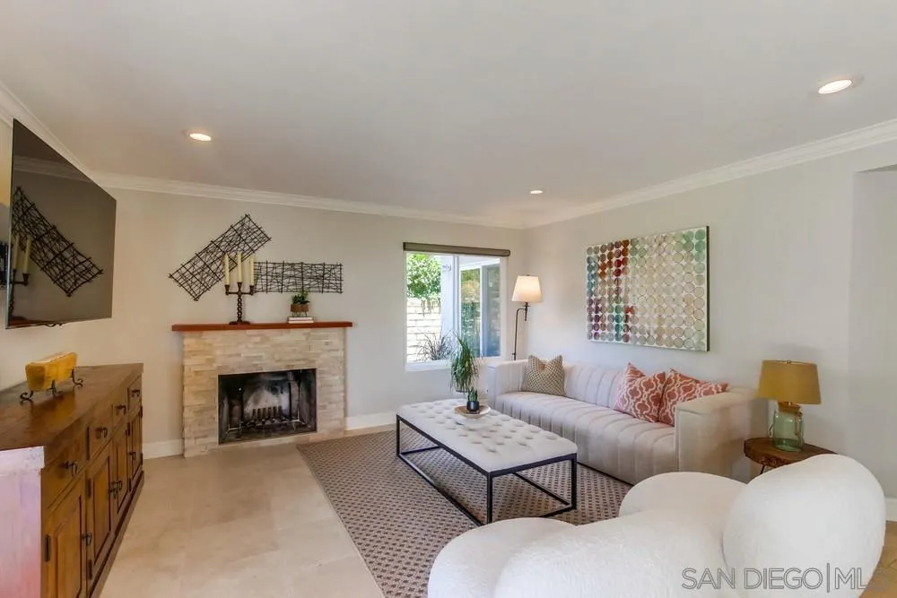 16101 Via Madera Circa West Rancho Santa Fe, CA 92091 - Photo 19 of 56 a living room with furniture and a fireplace