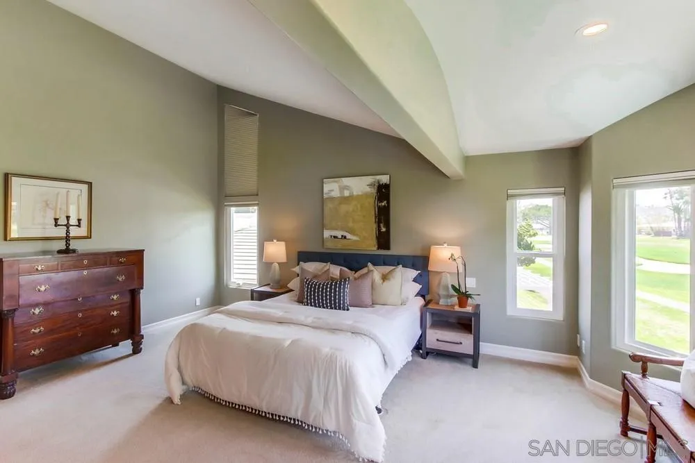 16101 Via Madera Circa West Rancho Santa Fe, CA 92091 - Photo 22 of 56 a bedroom with a bed and window