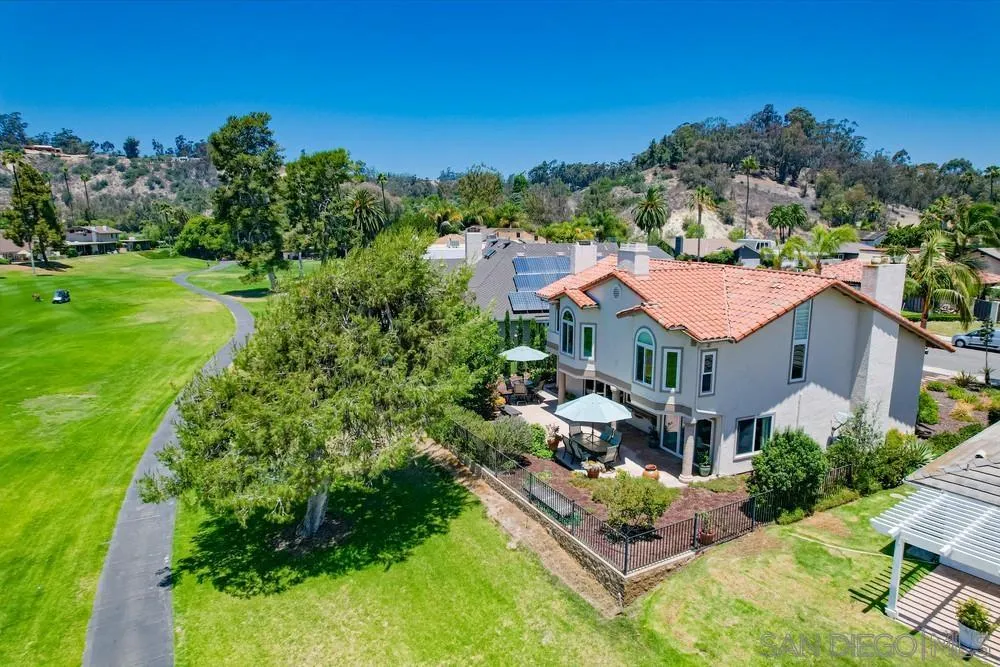 16101 Via Madera Circa West Rancho Santa Fe, CA 92091 - Photo 3 of 56 an aerial view of a house with a garden