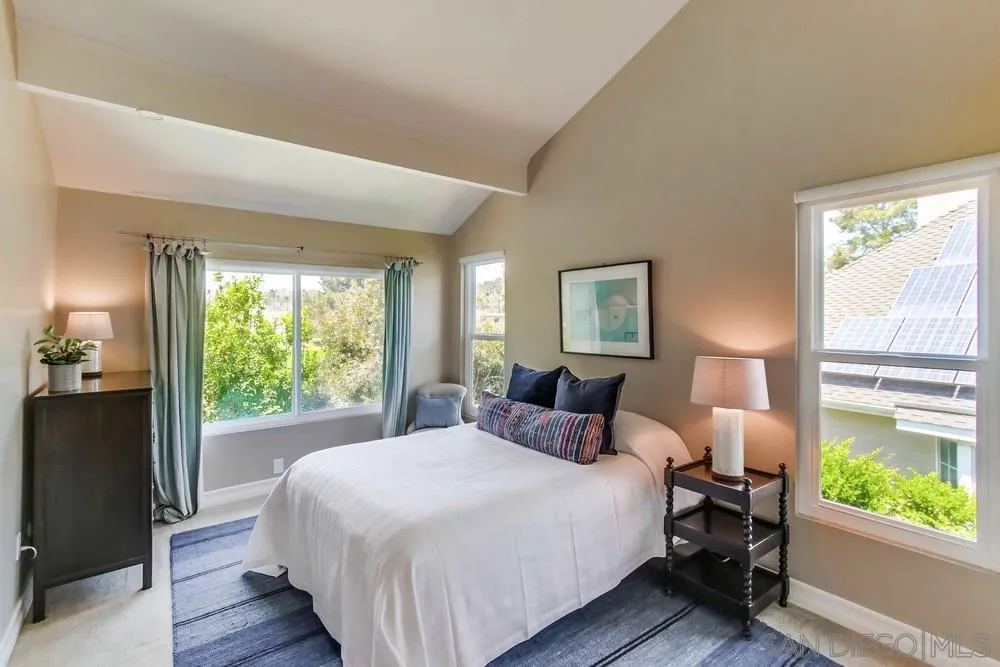 16101 Via Madera Circa West Rancho Santa Fe, CA 92091 - Photo 31 of 56 a bedroom with a bed and a window