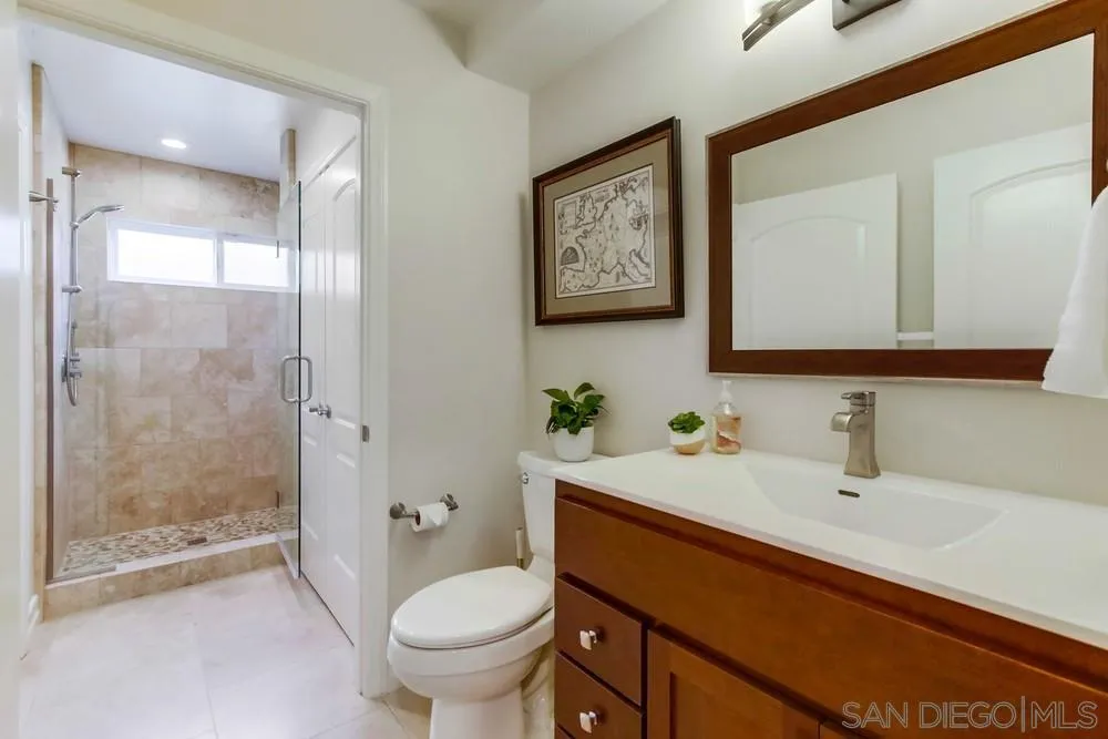 16101 Via Madera Circa West Rancho Santa Fe, CA 92091 - Photo 36 of 56 a bathroom with a sink toilet and shower