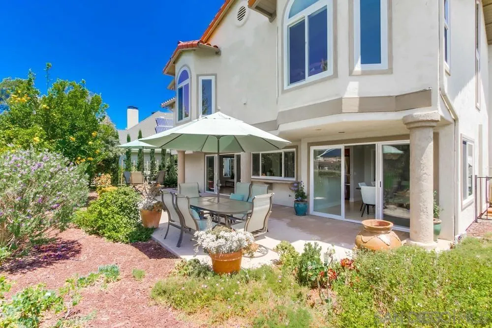 16101 Via Madera Circa West Rancho Santa Fe, CA 92091 - Photo 40 of 56 a view of a house with backyard porch and sitting area
