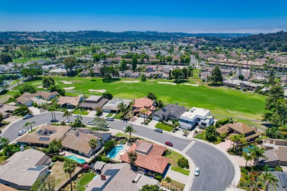 16101 Via Madera Circa West Rancho Santa Fe, CA 92091 - Photo 49 of 56 an aerial view of a houses with a garden and lake view