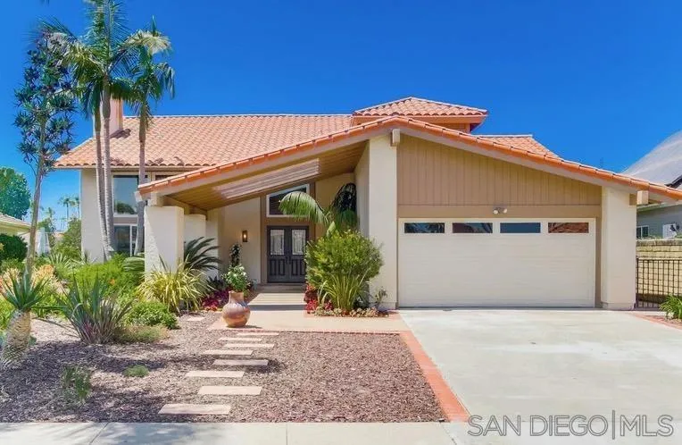 16101 Via Madera Circa West Rancho Santa Fe, CA 92091 - Photo 52 of 56 a front view of a house with a yard