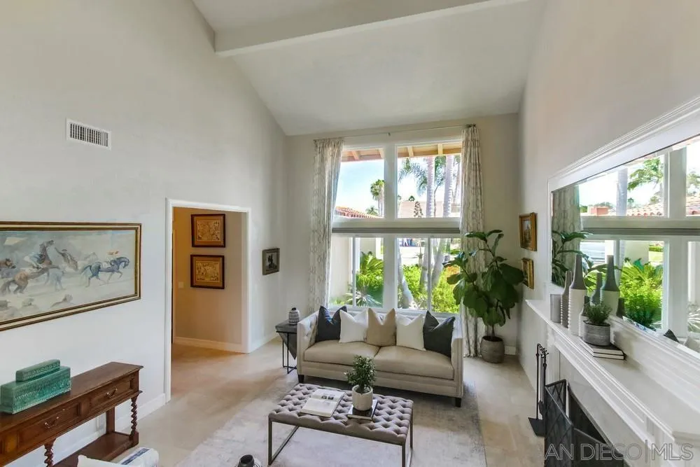 16101 Via Madera Circa West Rancho Santa Fe, CA 92091 - Photo 9 of 56 a living room with furniture and a large window