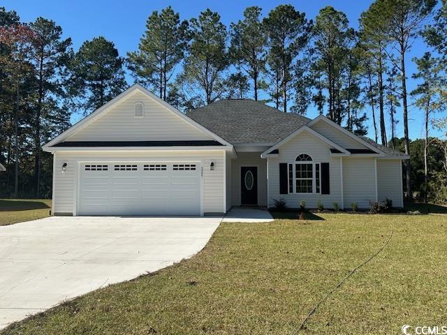 3397 Dusty Road Loris, SC 29569 - Photo 1 of 10 Ranch-style house with a front yard and a garage