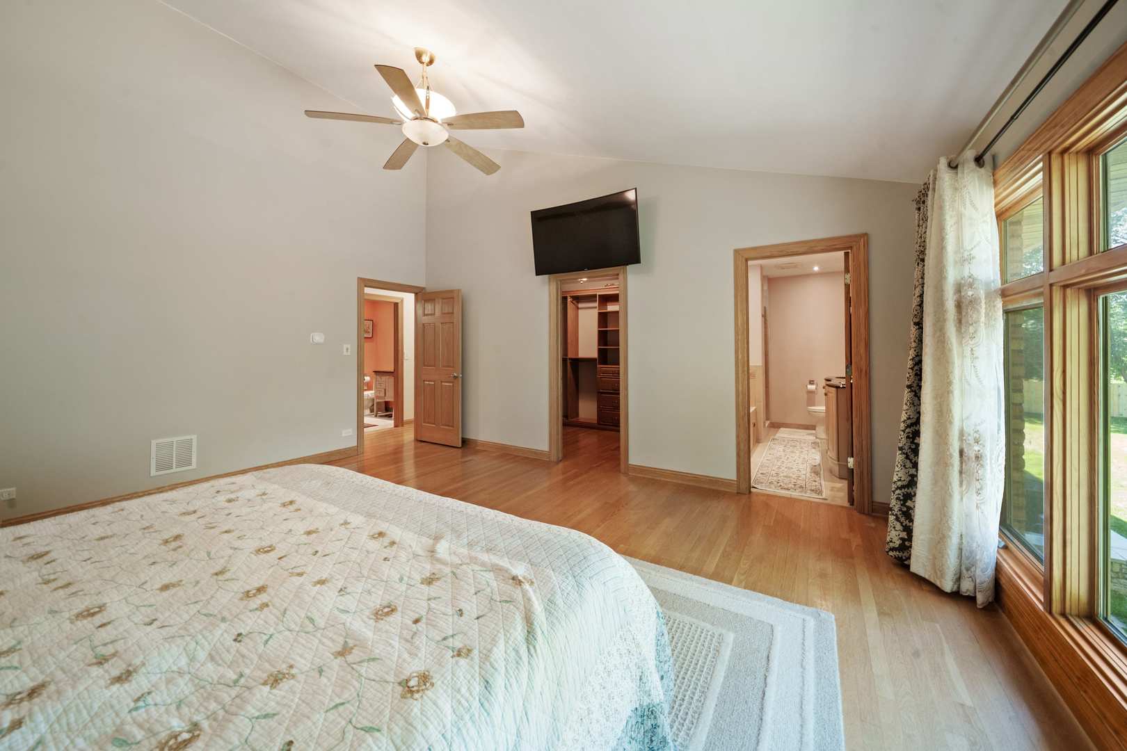 5N750 Medinah Road Medinah, IL 60157 - Photo 19 of 53 a bedroom with a bed and a flat screen tv