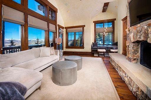 3618 Daybreak Ridge Road Avon, CO 81620 - Photo 5 of 14 a living room with furniture and a fireplace