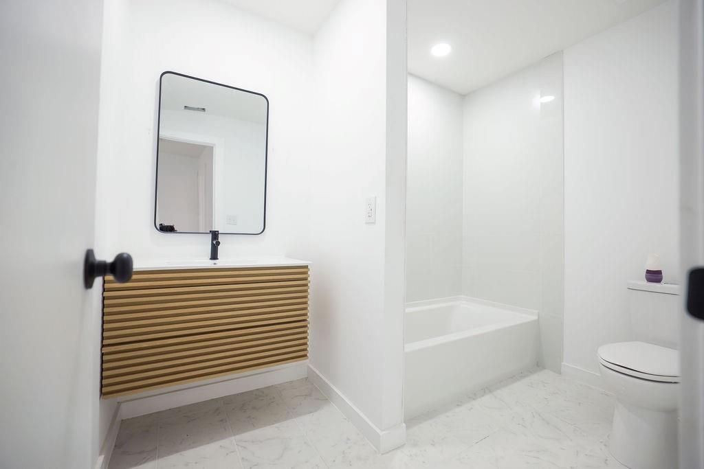 250 Skyview Point, TX 75472 - Photo 14 of 23 a bathroom with a sink a toilet and shower