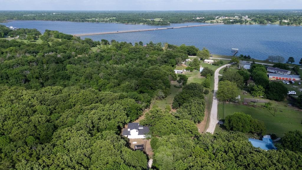 250 Skyview Point, TX 75472 - Photo 19 of 23 an aerial view of a houses with a lake view