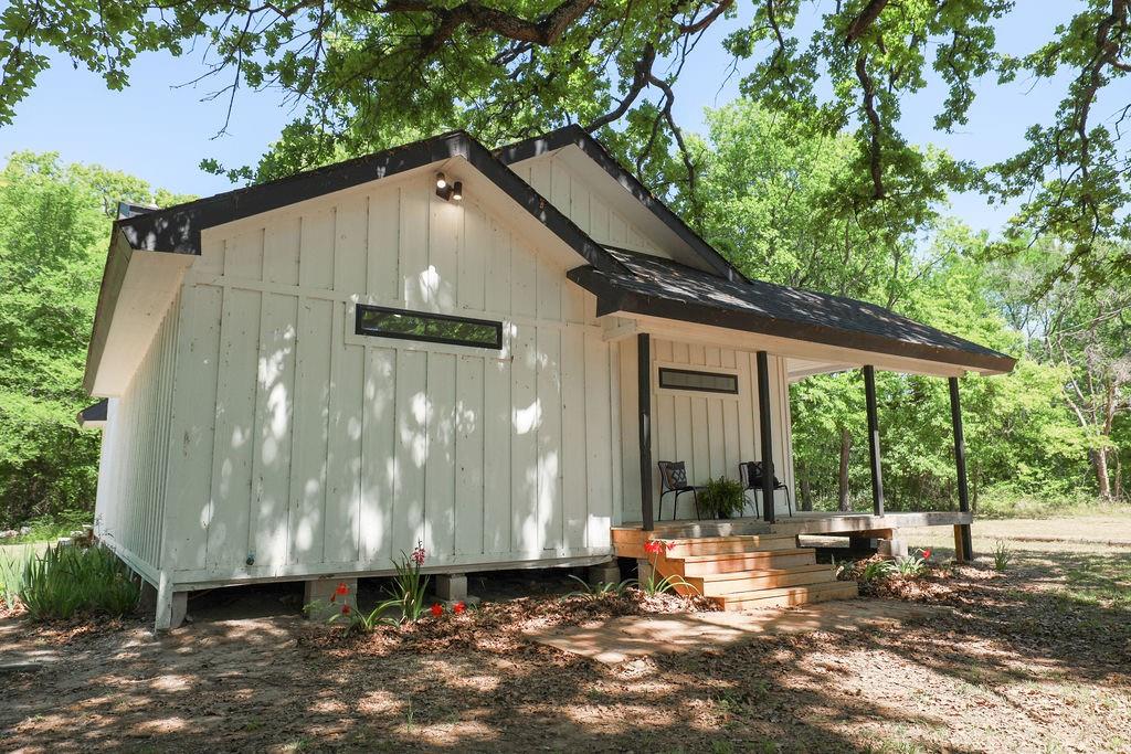 250 Skyview Point, TX 75472 - Photo 20 of 23 a front view of a house with a yard