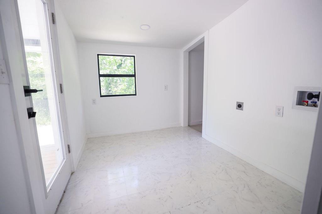 250 Skyview Point, TX 75472 - Photo 7 of 23 a view of an empty room with a window