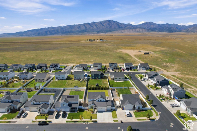 7939 Seattle Slew Road Eagle Mountain, UT 84005 - Photo 52 of 52 Residential community featuring paved streets and manicured lawns