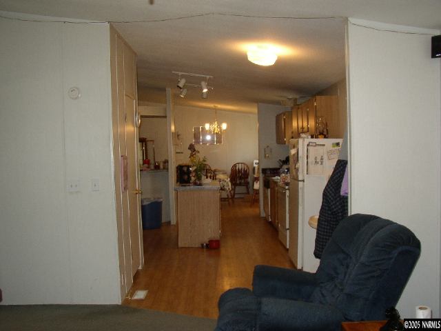 6135 Jacobs Road Fallon, NV 89406 - Photo 7 of 9 a living room with couches and a view of kitchen