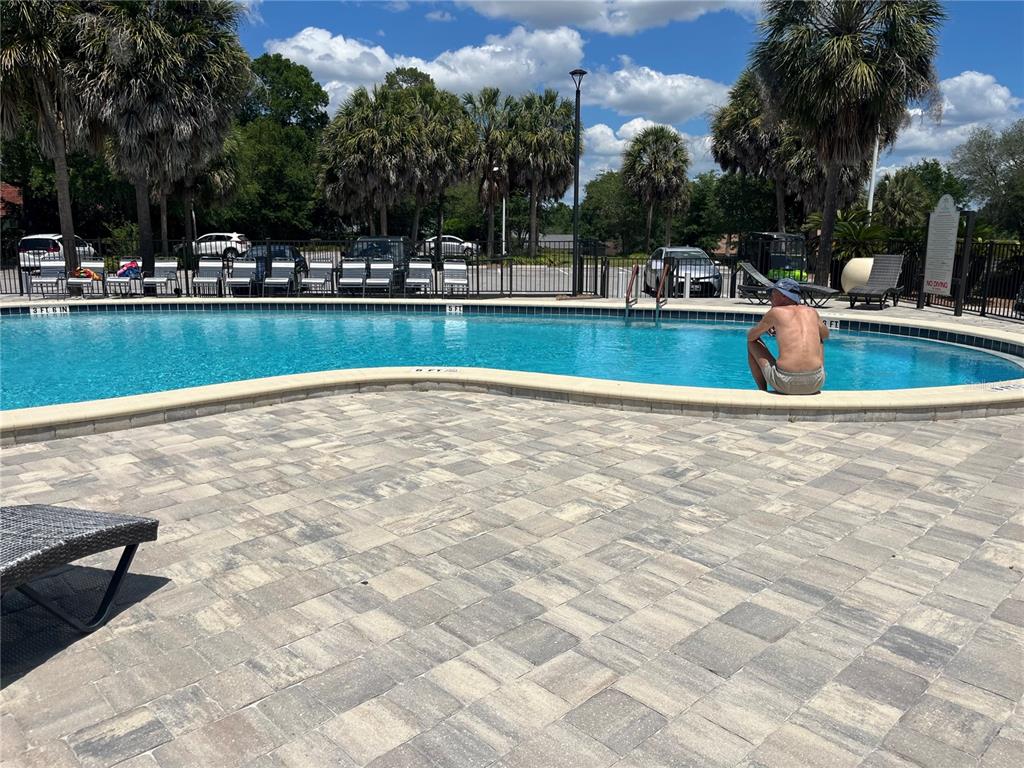 8744 Southwest 108th Ln Road Ocala, FL 34481 - Photo 22 of 28 a view of a swimming pool and outdoor space