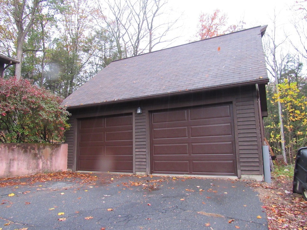 135 Fomer Road Southampton, MA 01073 - Photo 5 of 19 a front view of a house with garage