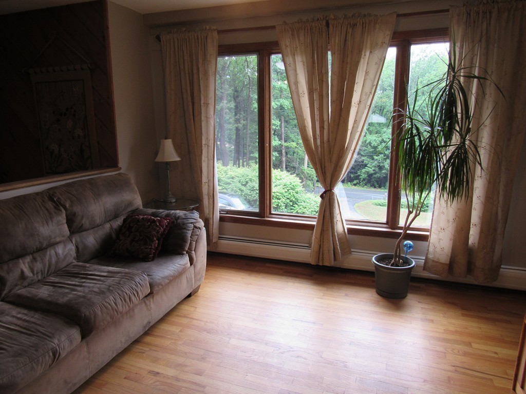 135 Fomer Road Southampton, MA 01073 - Photo 8 of 19 a living room with furniture and a large window