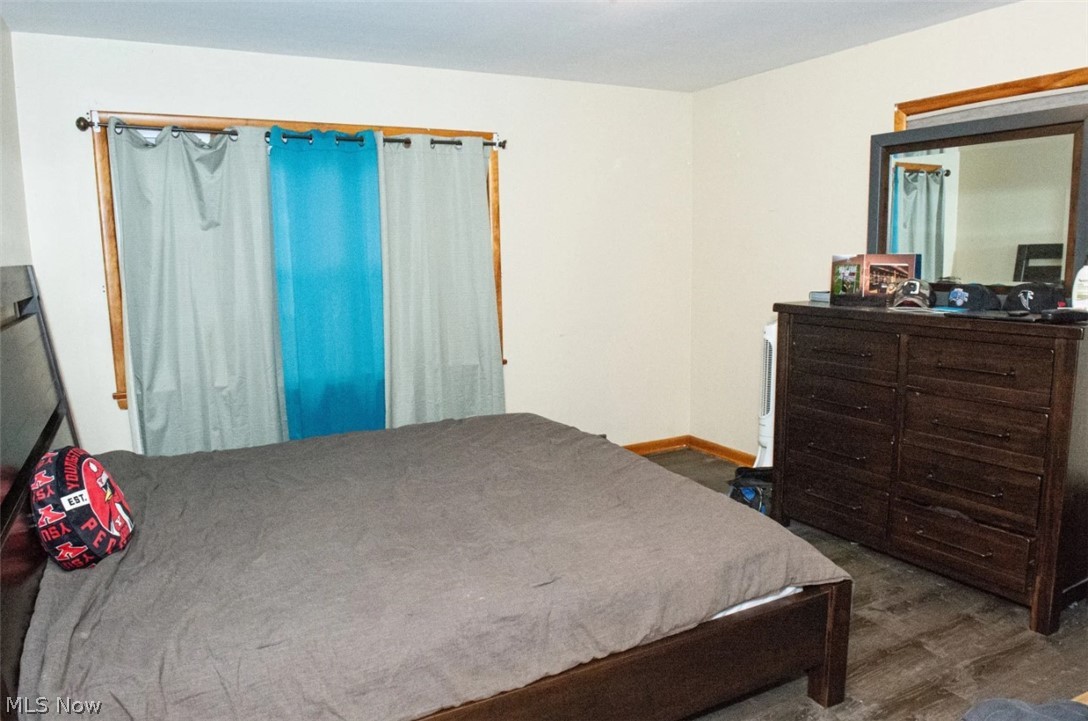 6714 Trenholm Road Youngstown, OH 44512 - Photo 10 of 22 Bedroom featuring hardwood / wood-style floors
