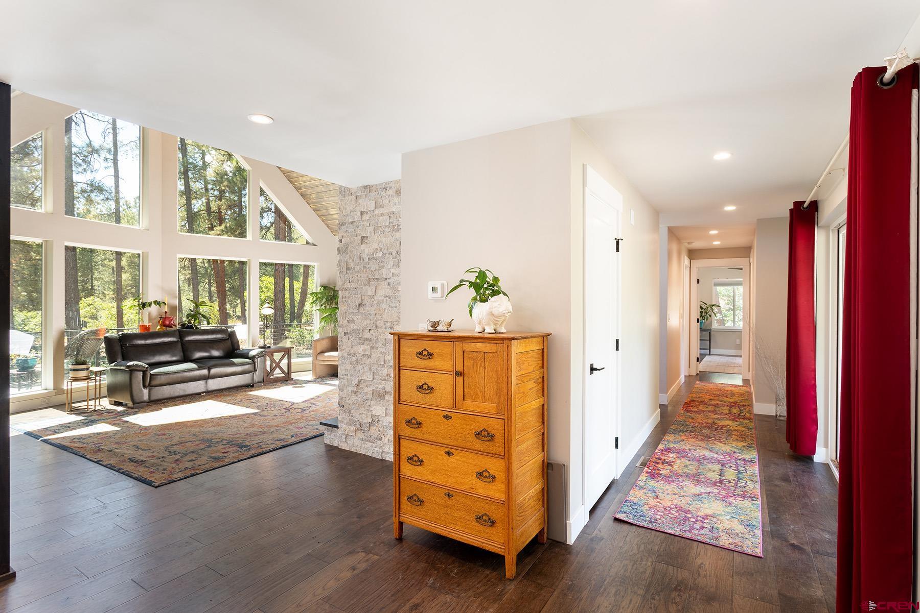 436 The Eagle Pass Durango, CO 81301 - Photo 13 of 29 a living room with furniture and a dresser