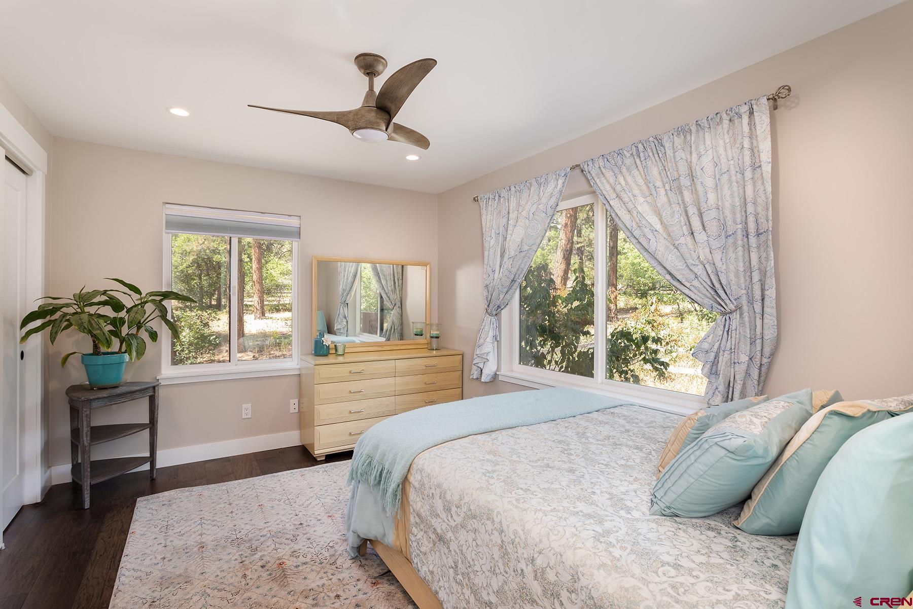 436 The Eagle Pass Durango, CO 81301 - Photo 17 of 29 a bedroom with a bed and a window