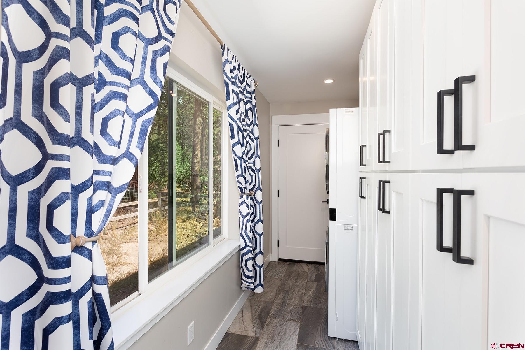 436 The Eagle Pass Durango, CO 81301 - Photo 21 of 29 a view of an entryway with wooden floor