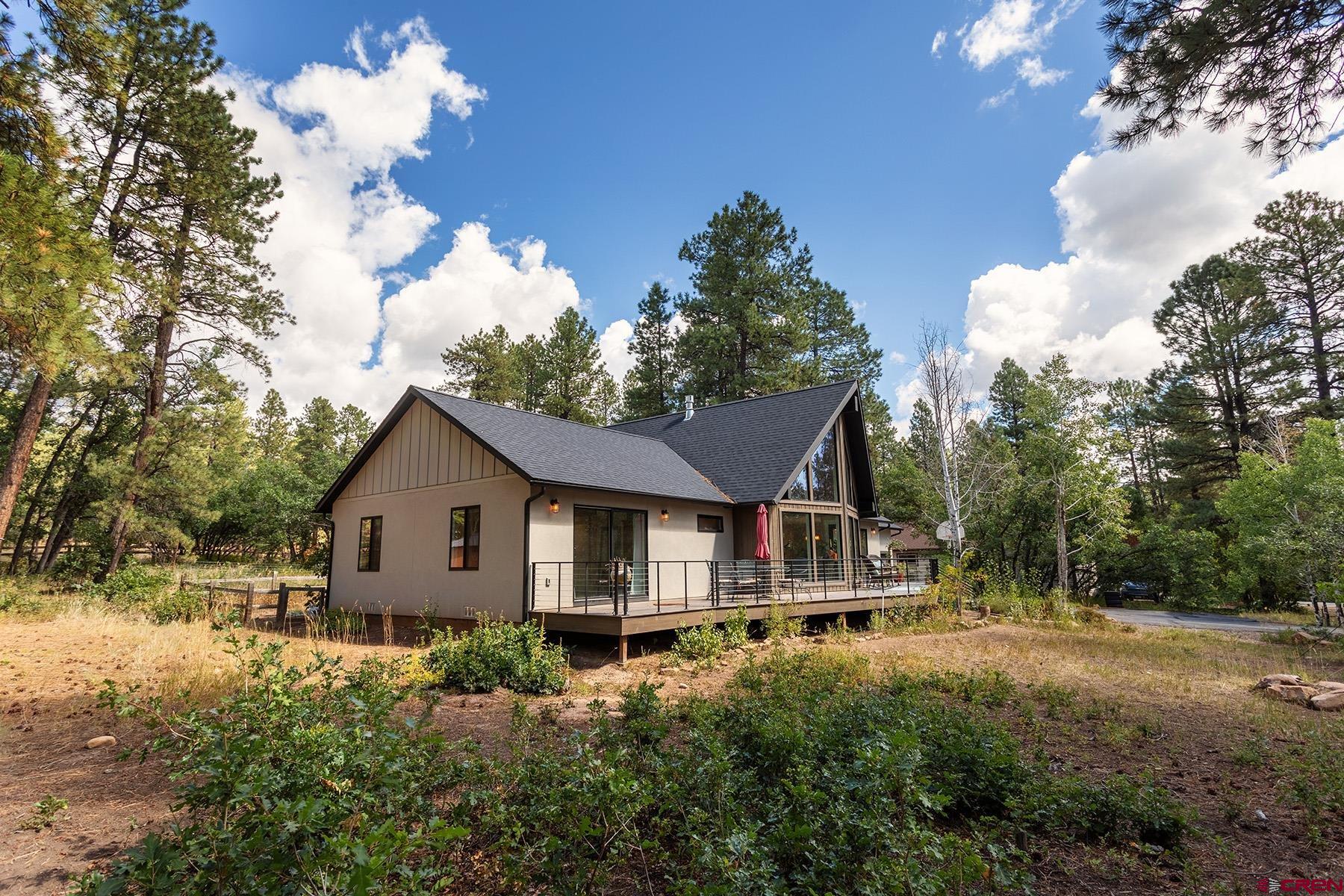 436 The Eagle Pass Durango, CO 81301 - Photo 4 of 29 a house view with a garden space